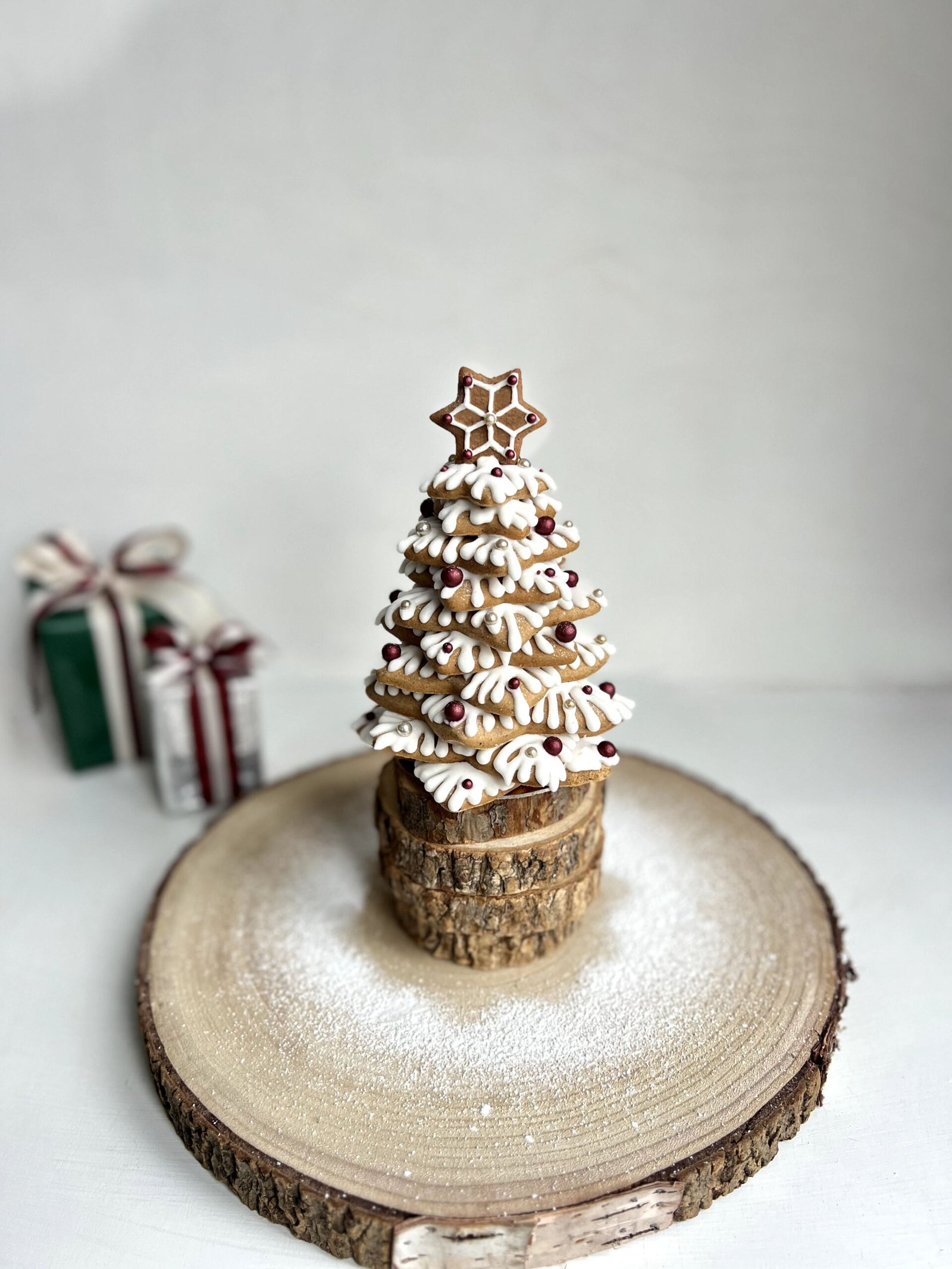 Gingerbread Christmas trees decorated with white icing and sugar pearls
